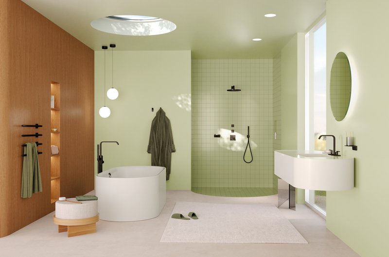 Badezimmer mit grünen Fliesen und schwarzen Akzenten